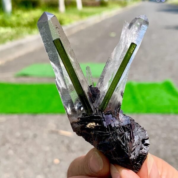 Green v shape tourmaline specimen